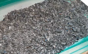 Burning charcoal in a grill
